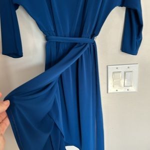 Royal blue faux wrap dress with belt and elastic waist.